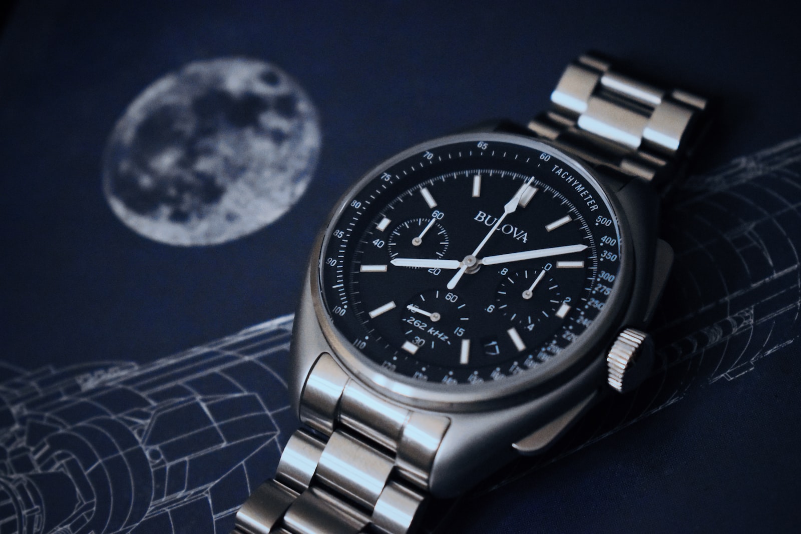 close-up of silver-colored and black chronograph watch